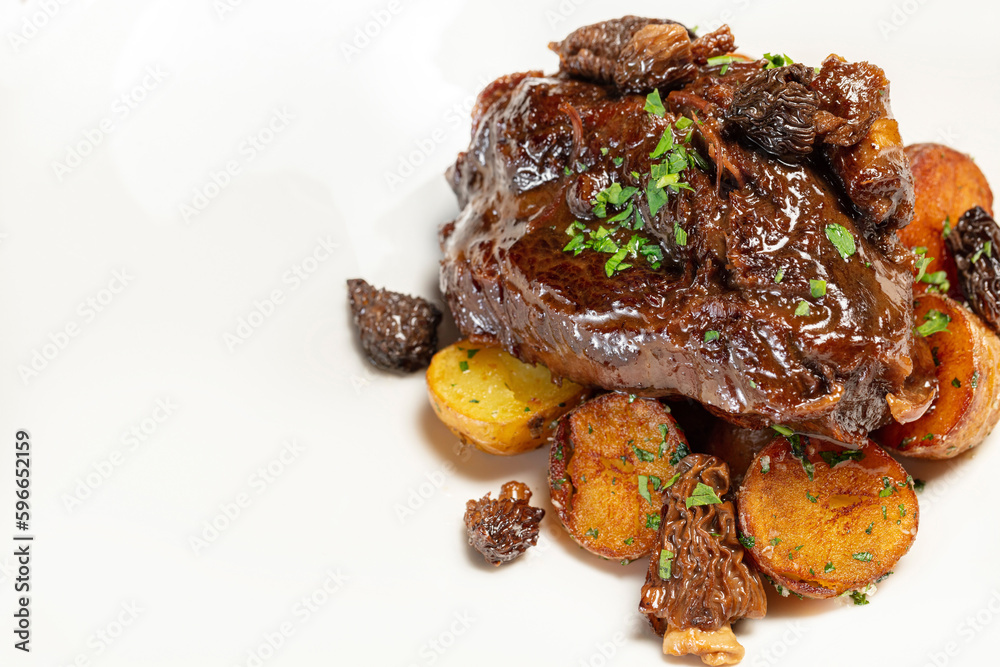 Veal cheeks with fried potatoes Veal cheeks with fried potatoes