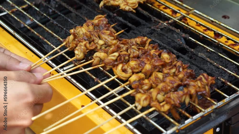 Satay Process Mushroom satay on grilled process. Sate is one of indonesian famous ...