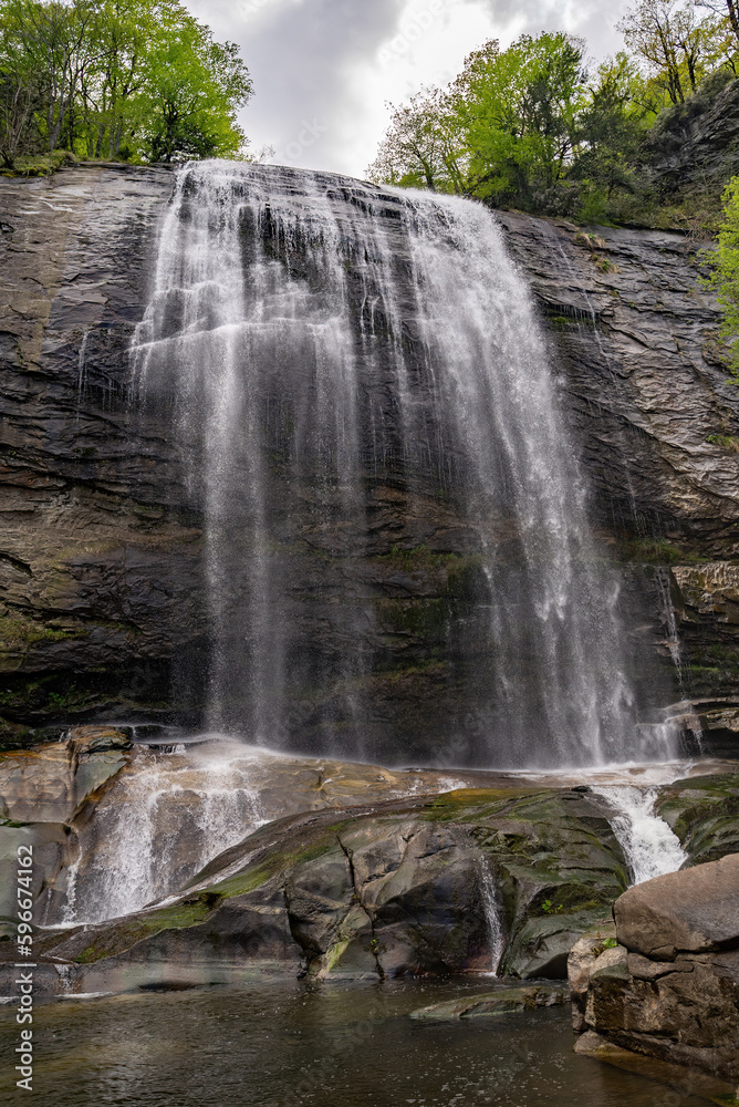 Obraz premium Beautiful waterfall in wild jungle forest. Travel and adventure landscape.