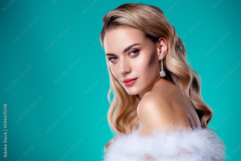 Portrait of pop star lady photographing for vogue magazine wear fluffy scarf diamond earrings blue color background Portrait of pop star lady photographing for vogue magazine wear fluffy scarf diamond earrings blue color background