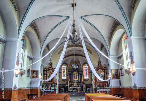 Main nave of St Joseph Church in Zalipie village, known for a custom of painting buildings with floral motifs, Poland photo