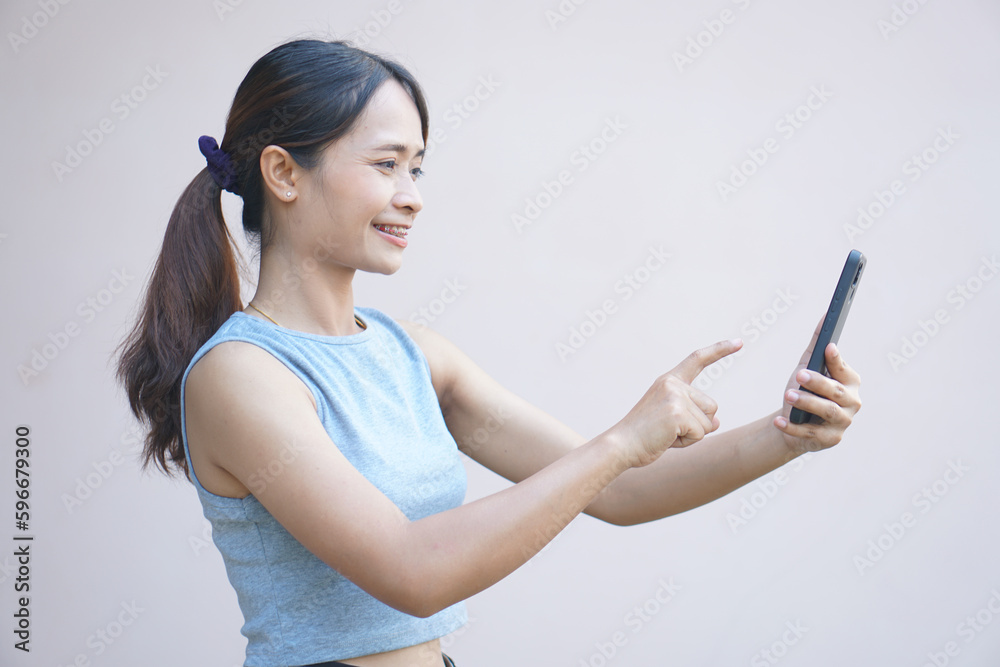 Asian woman video call with friend Asian woman video call with friend