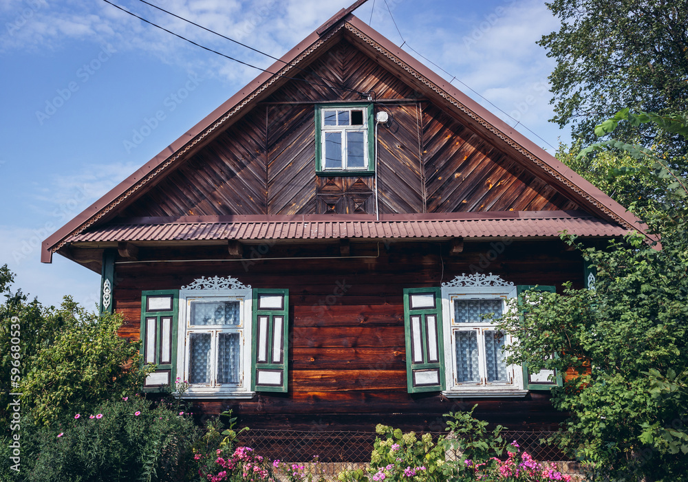 Wooden house in Soce village, famous for traditional folk architecture of Podlasie region, Poland
