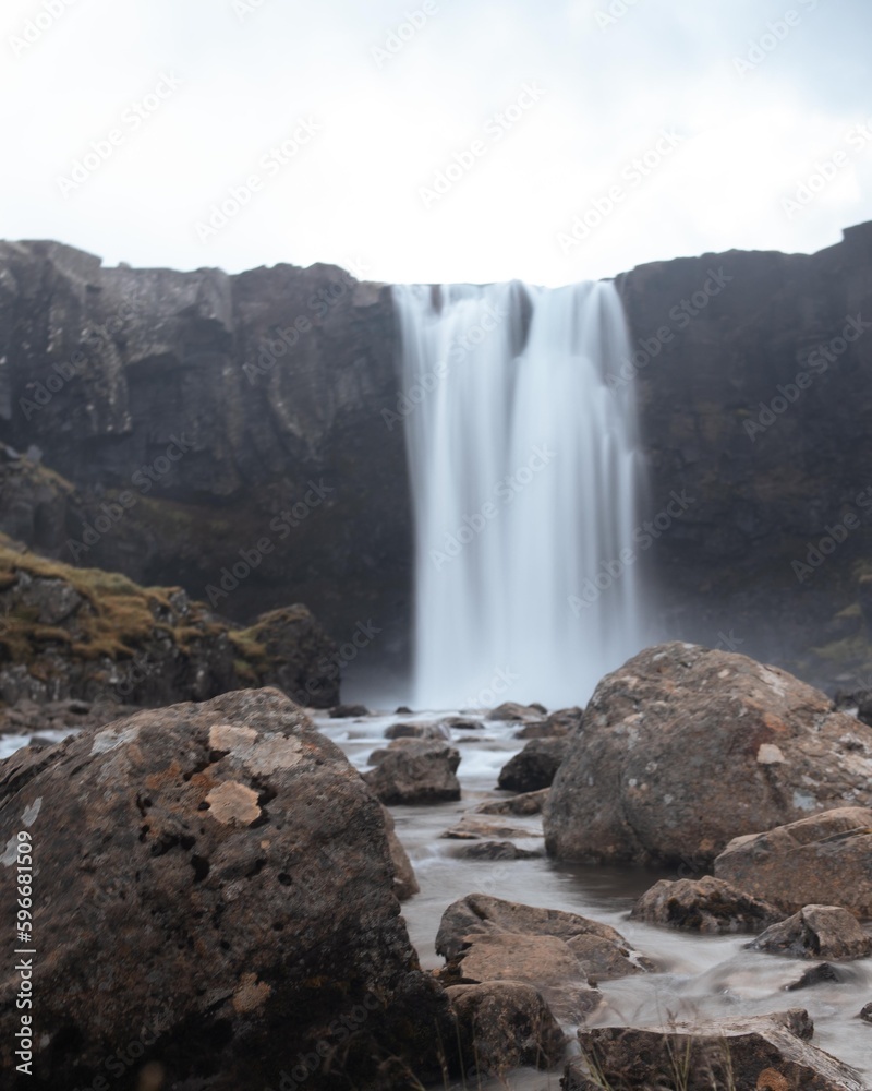 Drone Aerial of Kerlingarfoss Waterfall near Olafsvik on Iceland's Snafellsnes peninsula. High quality photo. Beautiful waterfall with the Snaefellsjokull Volcano in the background. Drone Aerial of Kerlingarfoss Waterfall near Olafsvik on Iceland's Snafellsnes peninsula. High quality photo. Beautiful waterfall with the Snaefellsjokull Volcano in the background.
