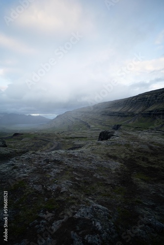 Remote and Rural Icelandic Highlands. High quality photo of mysterious location with fog surrounding the cliffs.