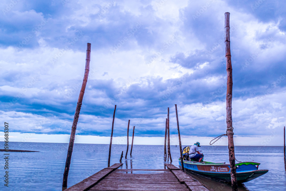 Fototapeta premium Wooden Pier With Blue Sea And Sky 