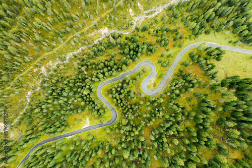 Aerial view of a serpentine in a summer forest.