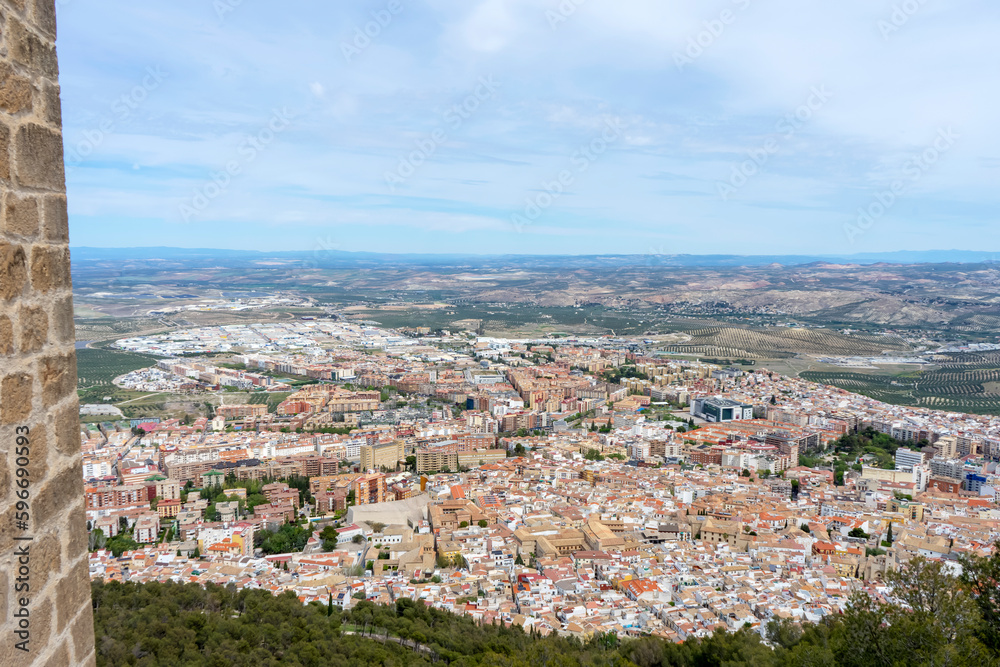 Panoramic city view from Medieval castle of Santa Catalina in sunny day in Jaen, Spain on April 6, 2023