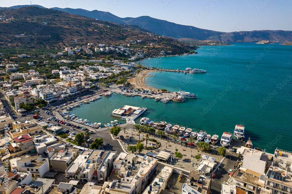Aerial view of the harbour in the holiday town of Elounda on the Greek island of Crete