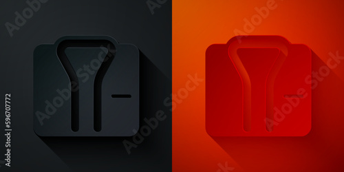 Paper cut Bathrobe icon isolated on black and red background. Paper art style. Vector