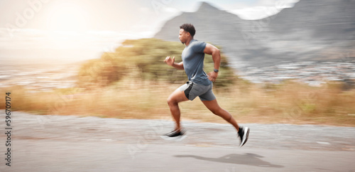 Boundaries are made to be pushed. Shot of a handsome young man running alone outdoors.