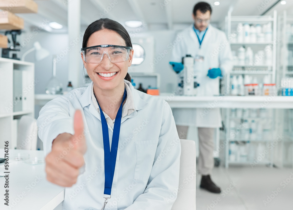 My experiment has been a roaring success. Portrait of a young scientist showing thumbs up in a lab. My experiment has been a roaring success. Portrait of a young scientist showing thumbs up in a lab.