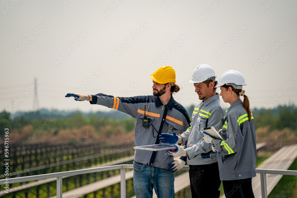 Engineer hand is installing and checking an operation of sun and cleanliness of photovoltaic solar panels, Engineer with energy measurement tool photovoltaic modules for renewable energy