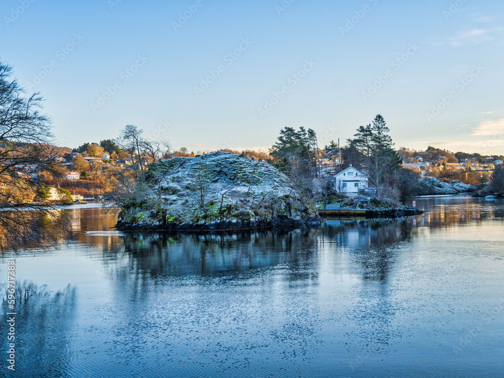 Houses on small rocky islands in Alver, Alversund, Bergen, Norway