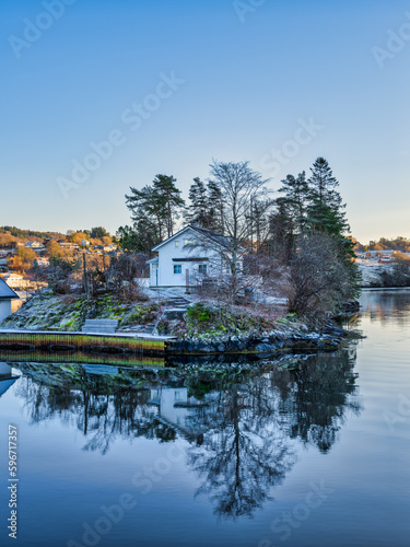 House on a small rocky islands in Alver, Alversund, Bergen, Norway.tif photo