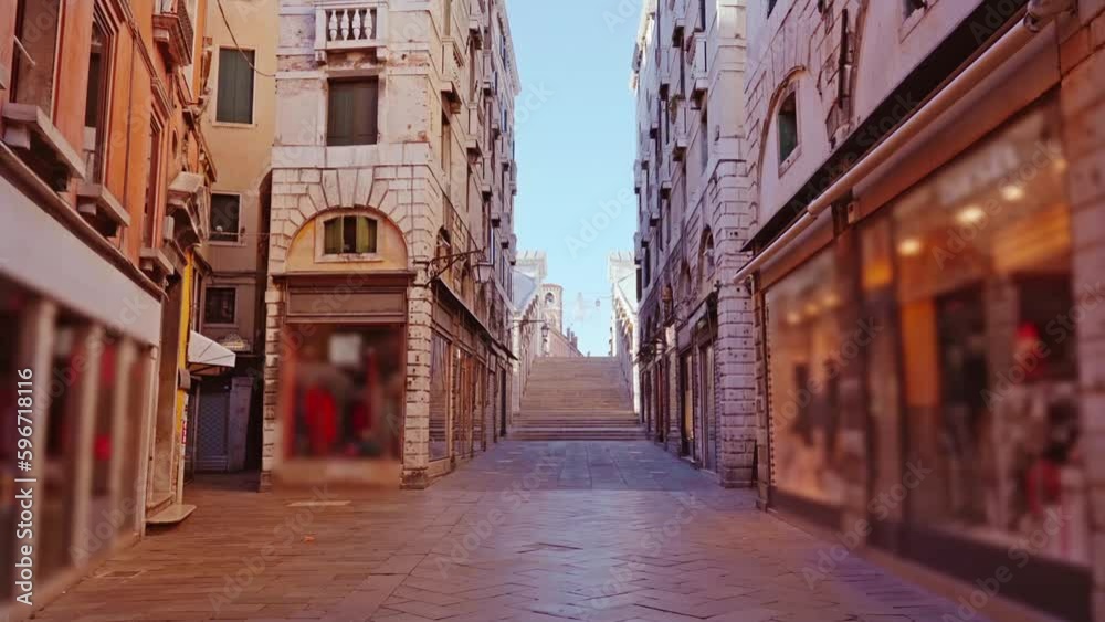 Motion along small street with closed shops to Rialto bridge Motion along small street with closed shops to Rialto bridge