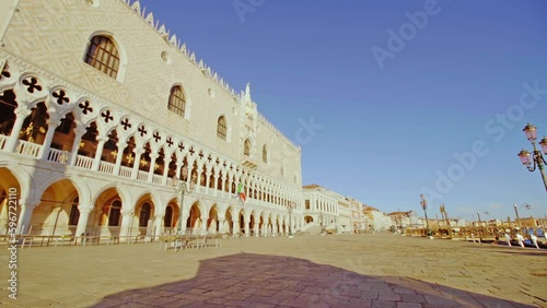 Stacked footbridges at Doge palace with Italian flag on wall photo