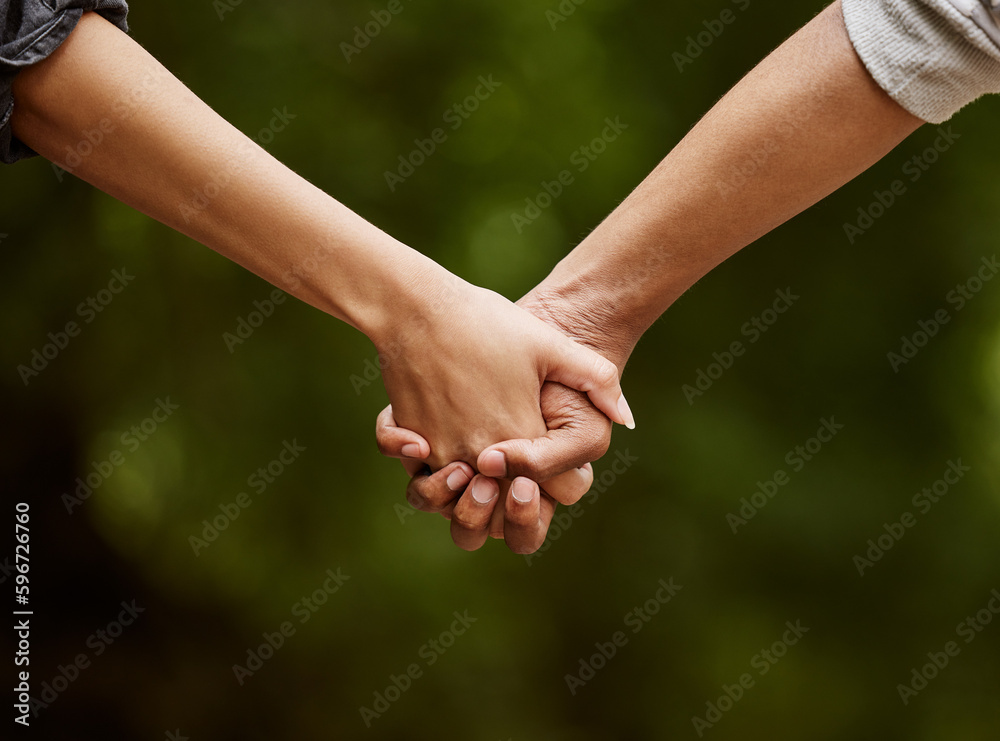 Walk with me through the wilderness. Closeup shot of an unrecognizable couple walking hand in hand through the wilderness. Walk with me through the wilderness. Closeup shot of an unrecognizable couple walking hand in hand through the wilderness.