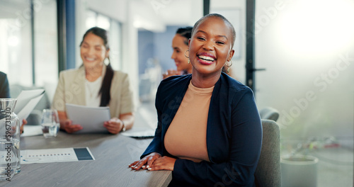 Meeting, happy and face of a business woman in discussion for a corporate project with her team. Collaboration, teamwork and portrait of a African female employee planning a strategy in the office.
