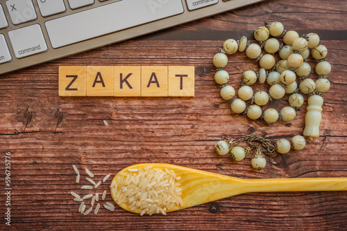 Conceptual zakat (islamic tax). Obligation to aid the poors. Islamic zakat concept. Selective focus.