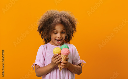 The child enjoys a delicious and cool ice cream. © ShunTerra