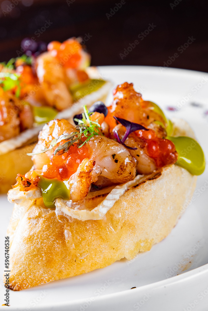 Prawns, shrimp seafood bruschetta with creamy cheese Prawns, shrimp seafood bruschetta with creamy cheese