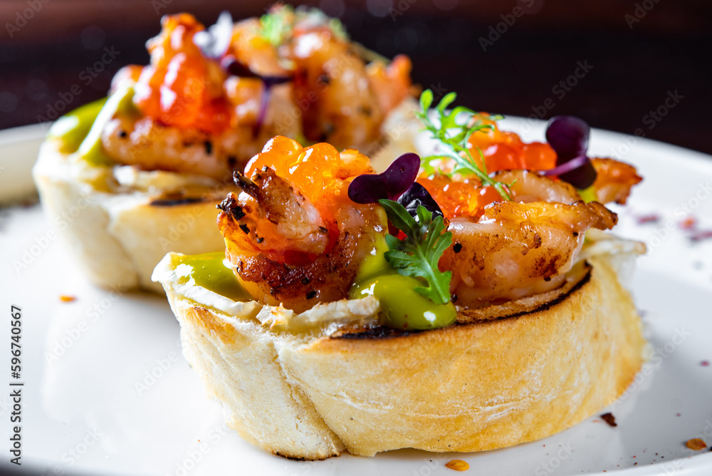 Prawns, shrimp seafood bruschetta with creamy cheese Prawns, shrimp seafood bruschetta with creamy cheese