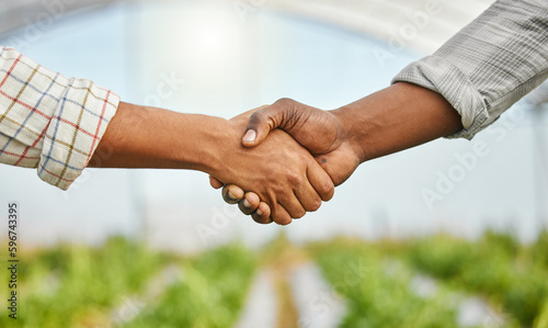 We only deal in fresh produce. Cropped shot of two unrecognizable people shaking hands on a farm.