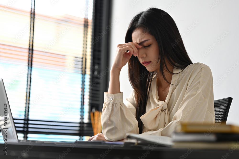 Stressed Business woman, High expectations at work, Demanding perfection, Problems with co-workers, Unfair organization and overwork. Stressed Business woman, High expectations at work, Demanding perfection, Problems with co-workers, Unfair organization and overwork.