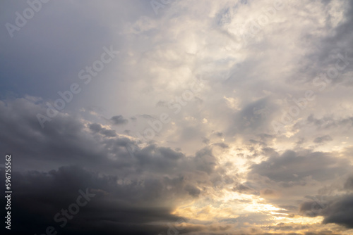 Fototapeta Naklejka Na Ścianę i Meble -  Beautiful moody sky with dark clouds at sunset, sky remplacement, nature background