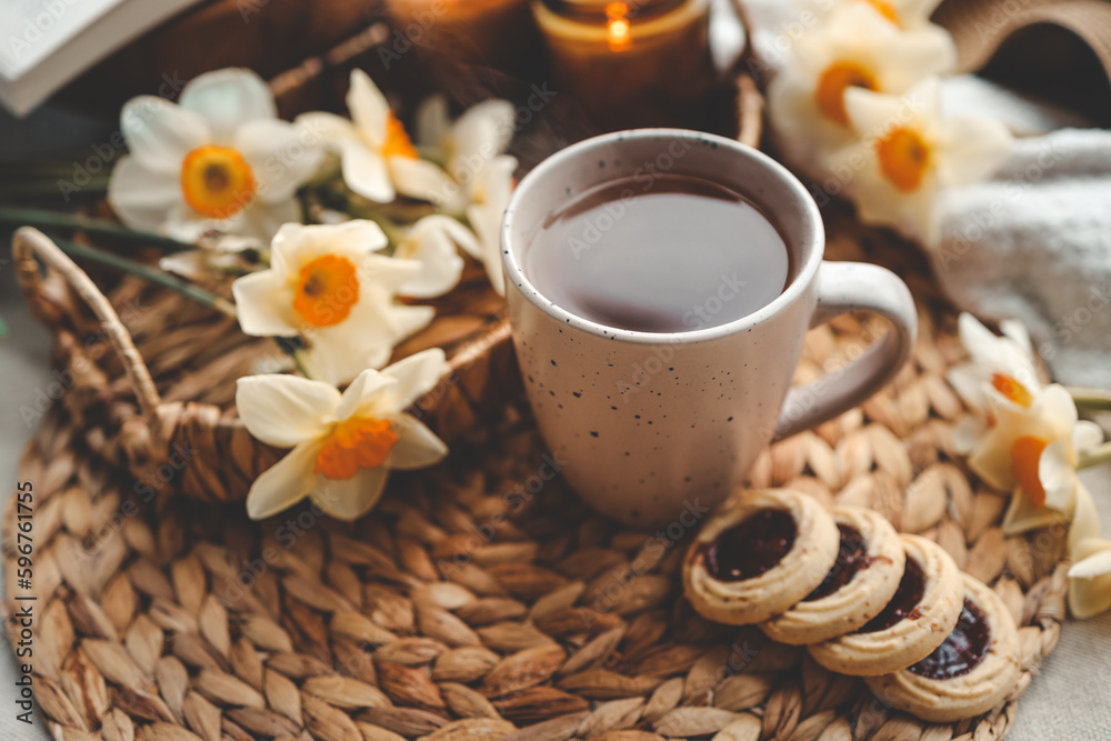 Cup of hot tea and spring home interior. good morning concept Cup of hot tea and spring home interior. good morning concept