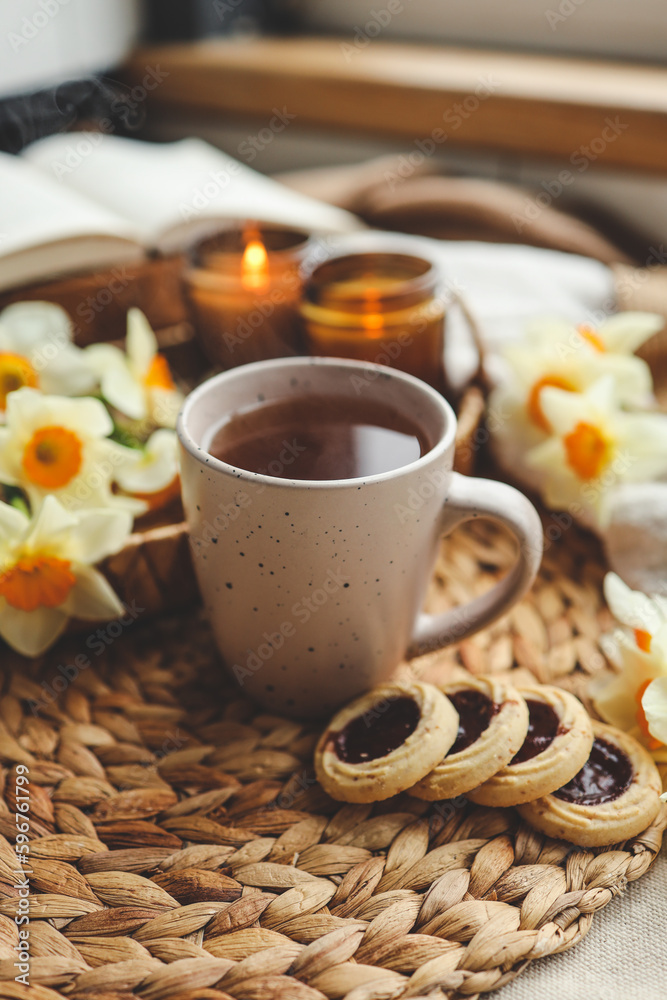 Cup of hot tea and spring home interior. good morning concept Cup of hot tea and spring home interior. good morning concept