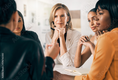 These are important conversations to have. Shot of a group of businesswomen in a meeting at work.