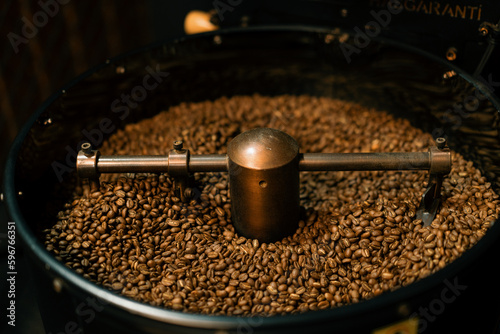 Coffee production is the process of roasting fresh coffee beans coffee beans are mixed and cooled close-up