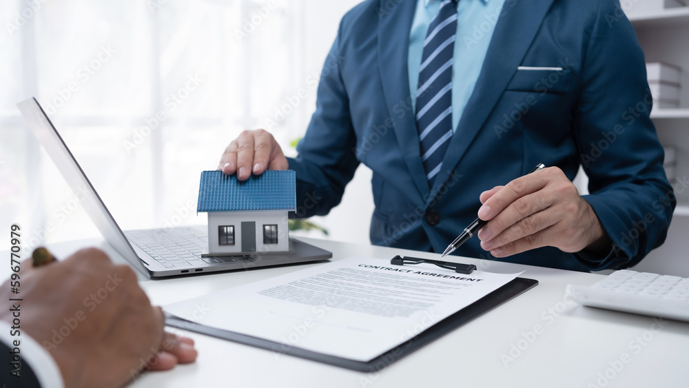 Real estate agent present house and land to their client by offering example of model home Introducing home loan loan, preliminary installment Offer idea for mortgage loan and home insurance. Real estate agent present house and land to their client by offering example of model home Introducing home loan loan, preliminary installment Offer idea for mortgage loan and home insurance.