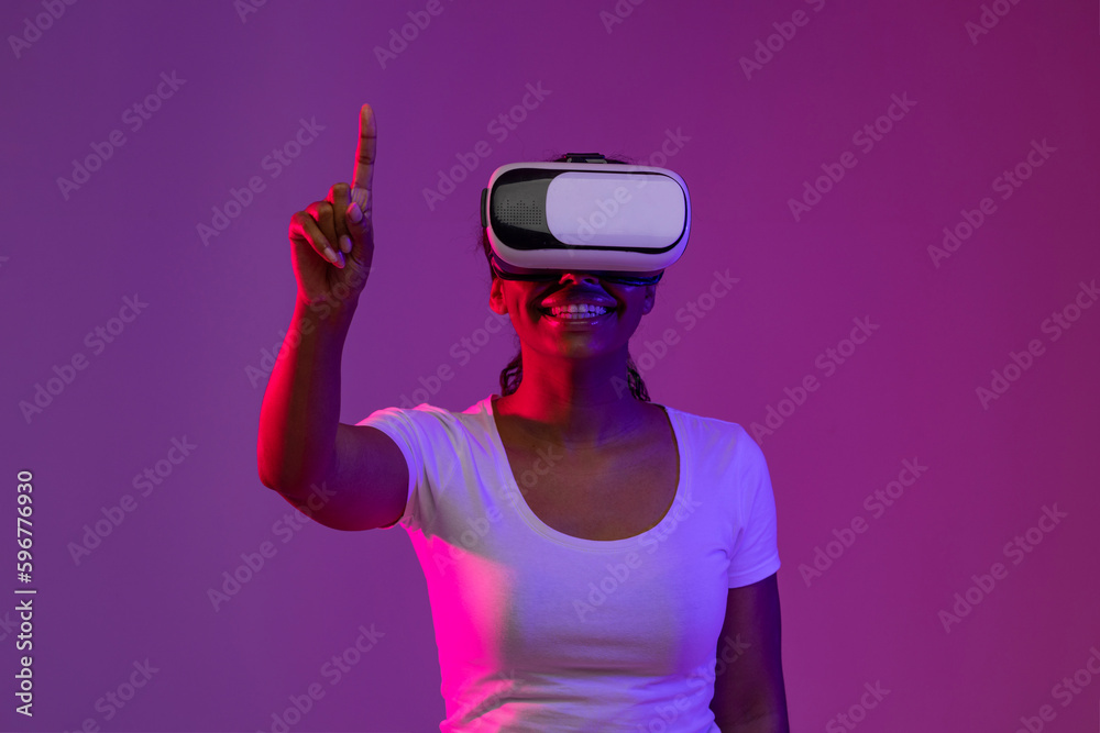 Excited Black Woman Wearing Vr Headset Enjoying Virtual Reality Experience Excited Black Woman Wearing Vr Headset Enjoying Virtual Reality Experience