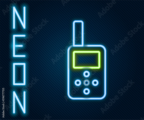 Glowing neon line Baby monitor walkie talkie icon isolated on black background. Colorful outline concept. Vector