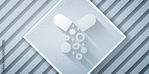 Paper cut Poisoned pill icon isolated on grey background. Pill with toxin. Dangerous drug. Paper art style. Vector