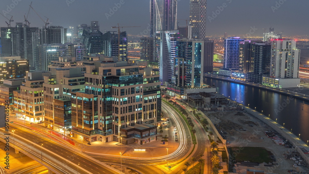 Bay Square district day to night timelapse with mixed use and low rise complex office buildings located in Business Bay in Dubai