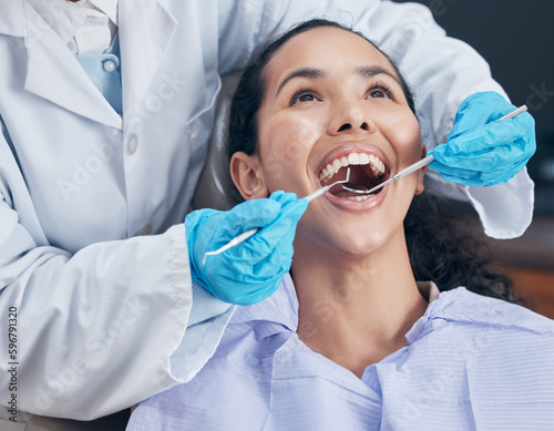 The perfect smile is easily achievable. Shot of a young woman having a procedure performed by her dentist.