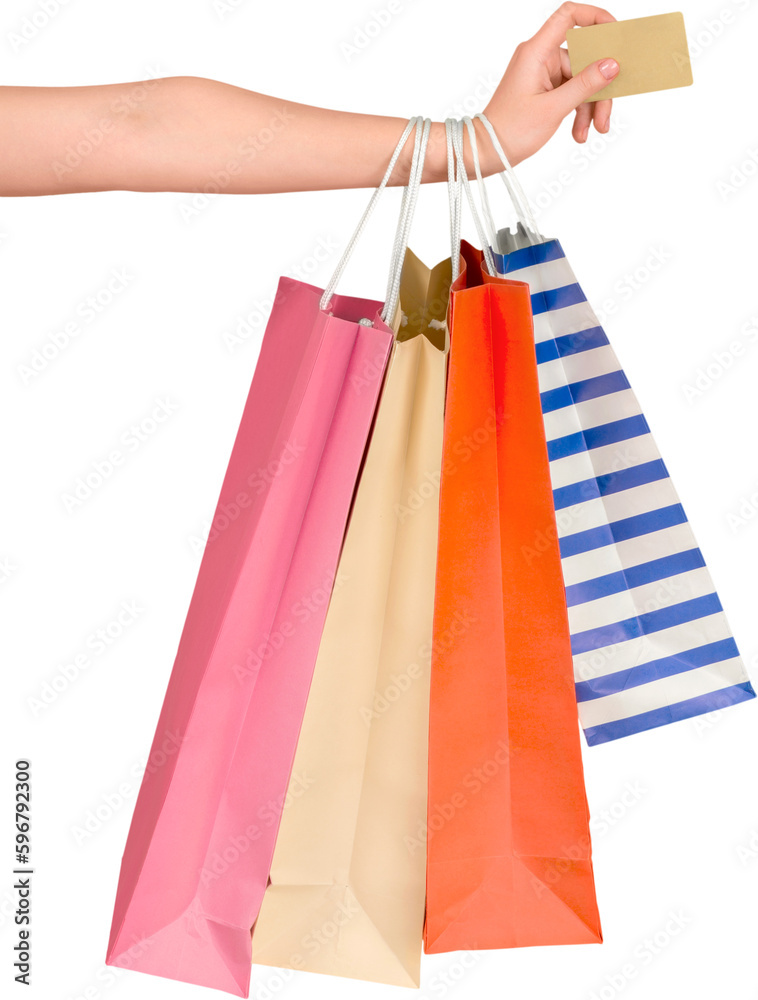 Woman hand with many shopping bags and credit card
