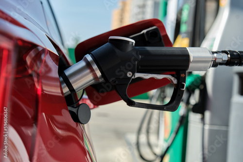Compressed Natural Gas (GNC) pump fueling a car