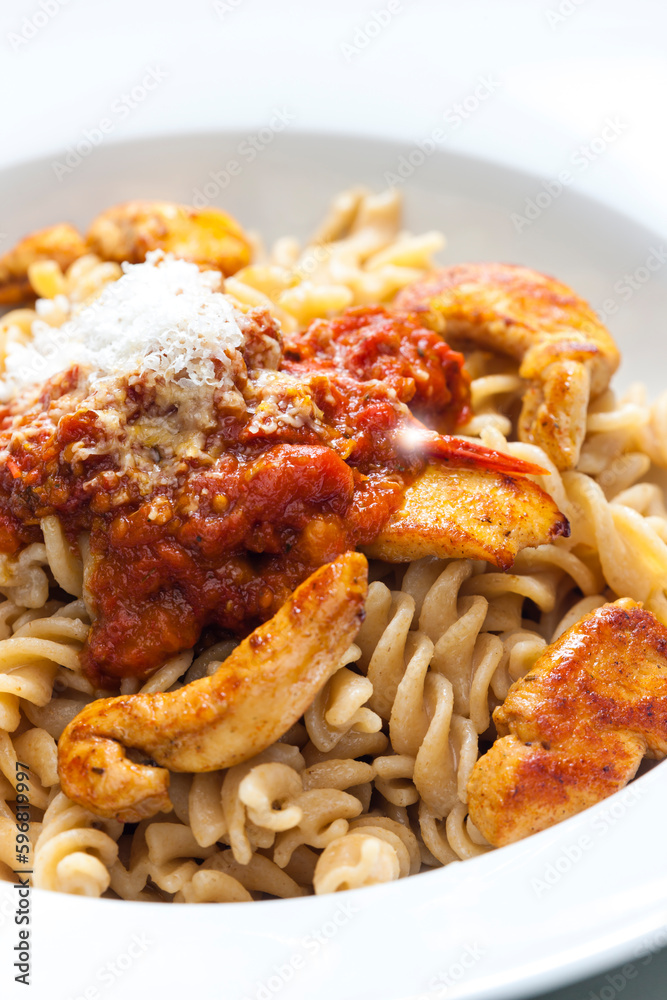 pasta fusilli with spicy chicken meat and tomato sauce pasta fusilli with spicy chicken meat and tomato sauce