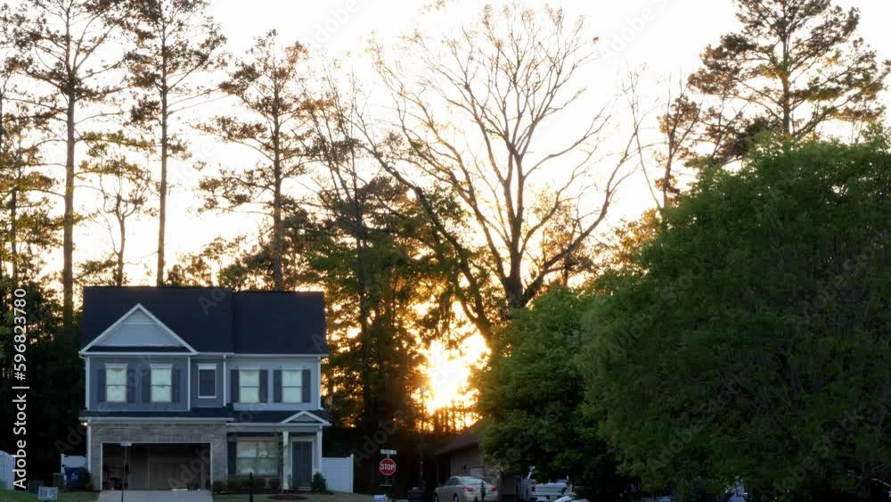 Sunset Over Beautiful Suburban Home Sunset Over Beautiful Suburban Home