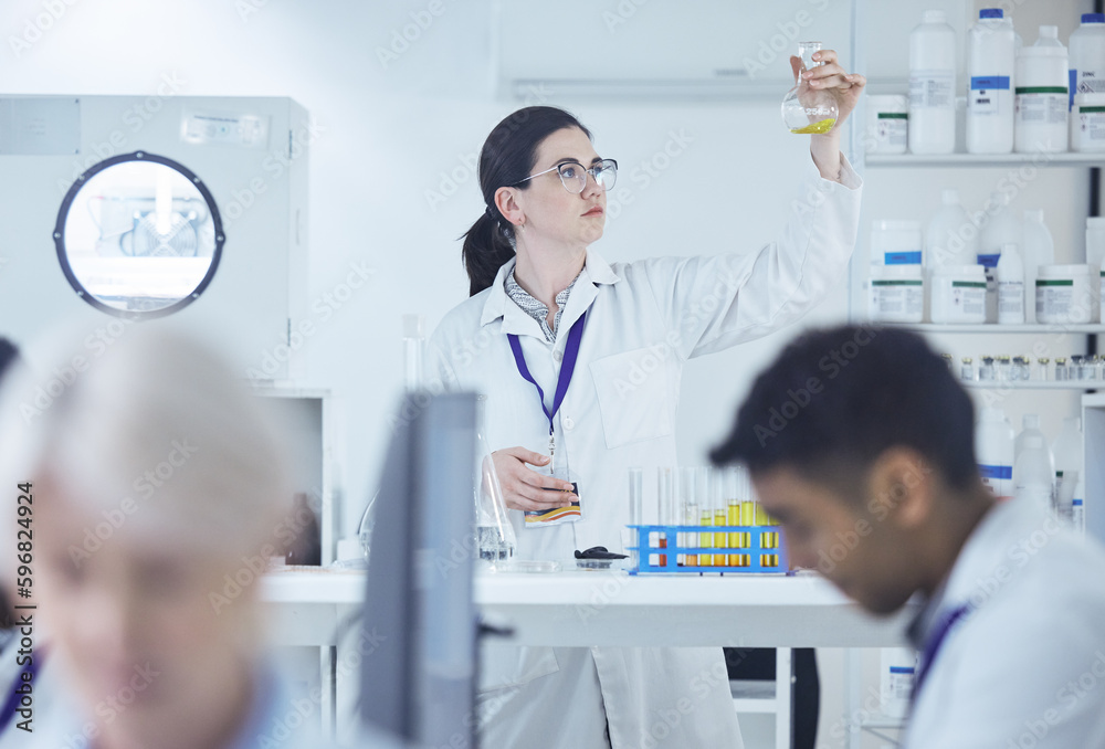 Putting in the work. Shot of a group of scientists working together. Putting in the work. Shot of a group of scientists working together.