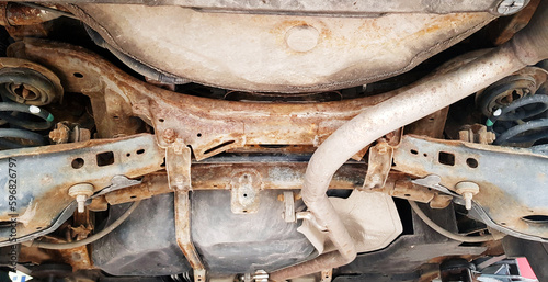 An old rusty car chassis