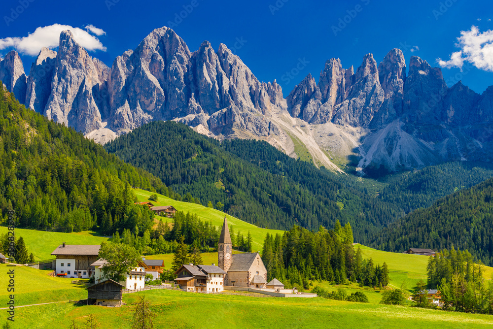 The church of Santa Maddalena and The Odle Mountain Peaks In Background, Panoramic View, Dolomites, Val di Funes, South Tyrol, Italy