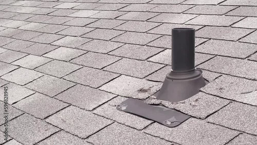 Rooftop vent pipe and shingles footage