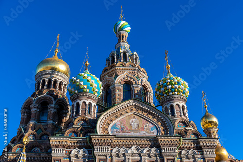 Church of the Savior on Spilled Blood (also known as Tserkovʹ Spasa na Krovi) in a sunny day in Saint Petersburg city, Russia. Clear blue sky. Religious arhitecture. Travel in Russia theme. photo
