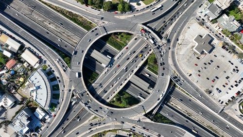 Aerial drone photo of multilevel circular ring road junction passing through urban city centre connecting National motorway and popular avenue